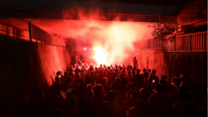 Residents of Martinique demonstrating in a street with smoke bombs in Fort-de-France, Martinique, 21 September 2024