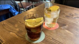 Two glasses of vermouth: one white and another red